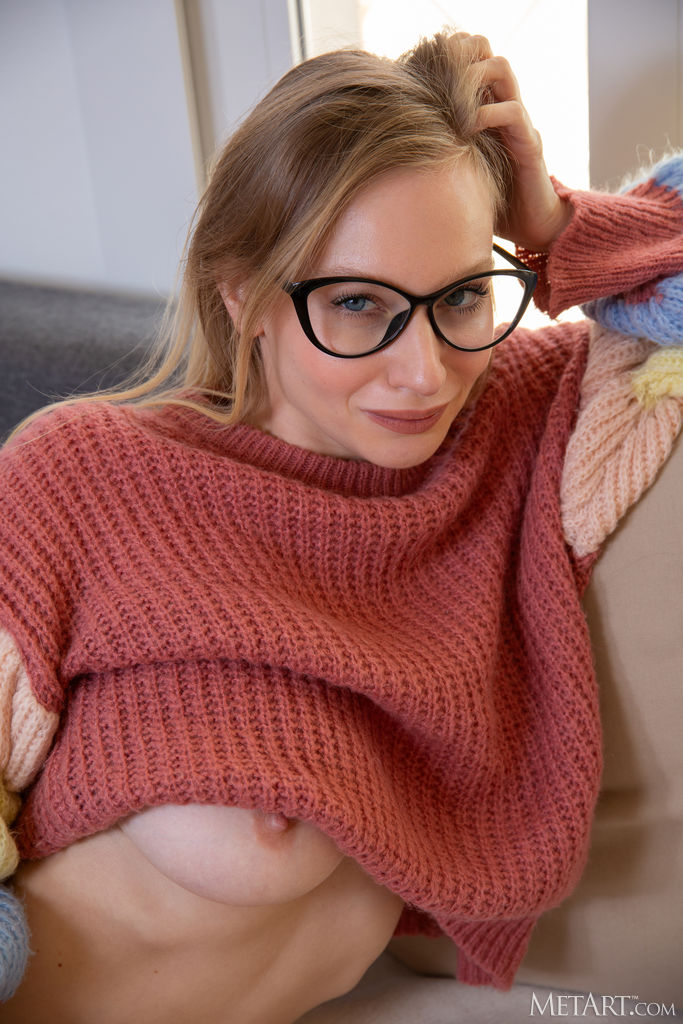 Sensual Annie Anne Teases With Striptease Antics On The Couch - Picture 03