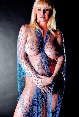 Blue fishnet looking well on Sonia Blake