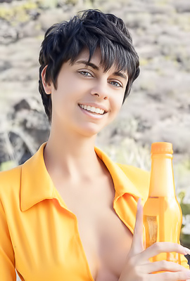 Kensi Dressed In A Bold Orange Crop Top That Hugs Her Perfect Breasts And A Matching Mini Skirt