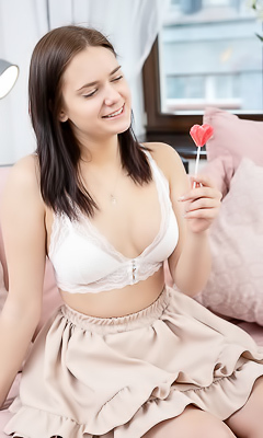 Tina Howl Flirty Look In Her Gorgeous Blue Eyes As She Sucks Her Lollipop