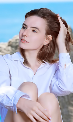 Nika Smiling With Pleasure As The Stimulating Ocean Breeze Caresses Her Sexy Body