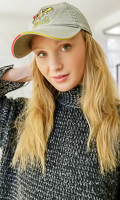 Dana Red With Strawberry-blonde Hair Lounging Naked In An Armchair