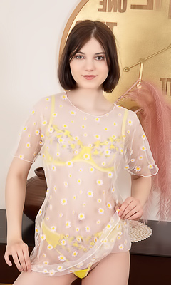 Sara Celeste Bending Over To Show How Her Thong Panties Nestle Between Her Perfect Buns