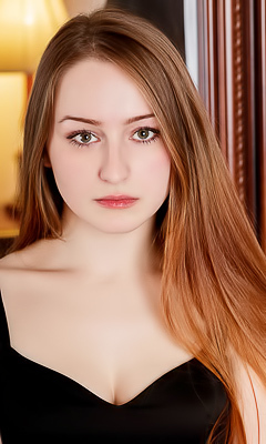 Evelin Her Soft Breasts Bare And Her Mesmerizing Blue Eyes Shining Seductively